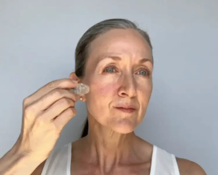 Woman using skincare device
